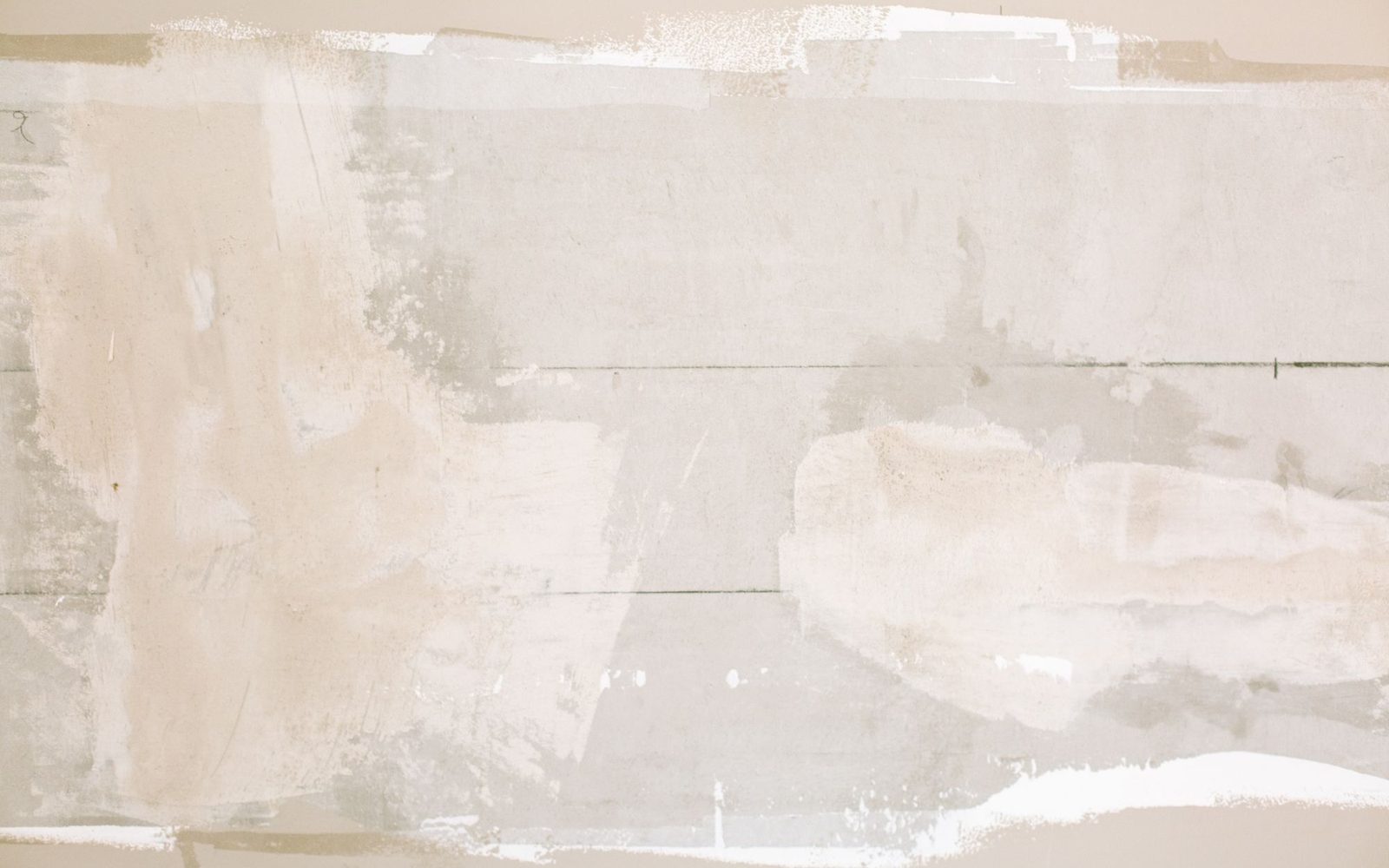 Patched and filled section of wall plaster before finishing